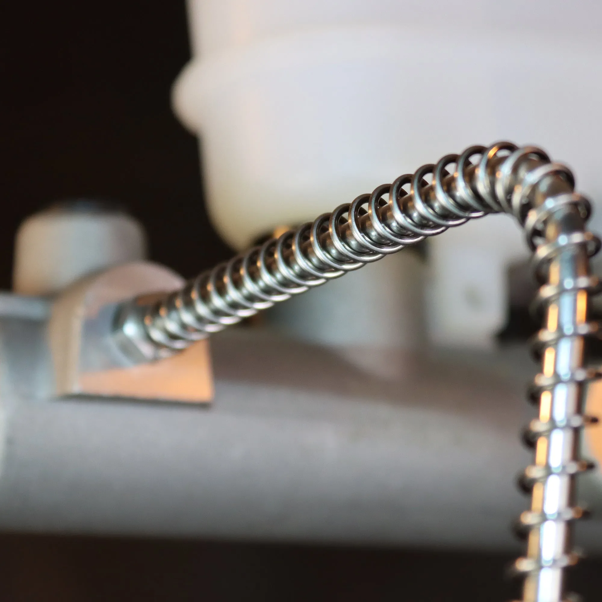 1/4" x 8' Stainless Steel Spring Gravel and Rock Guard