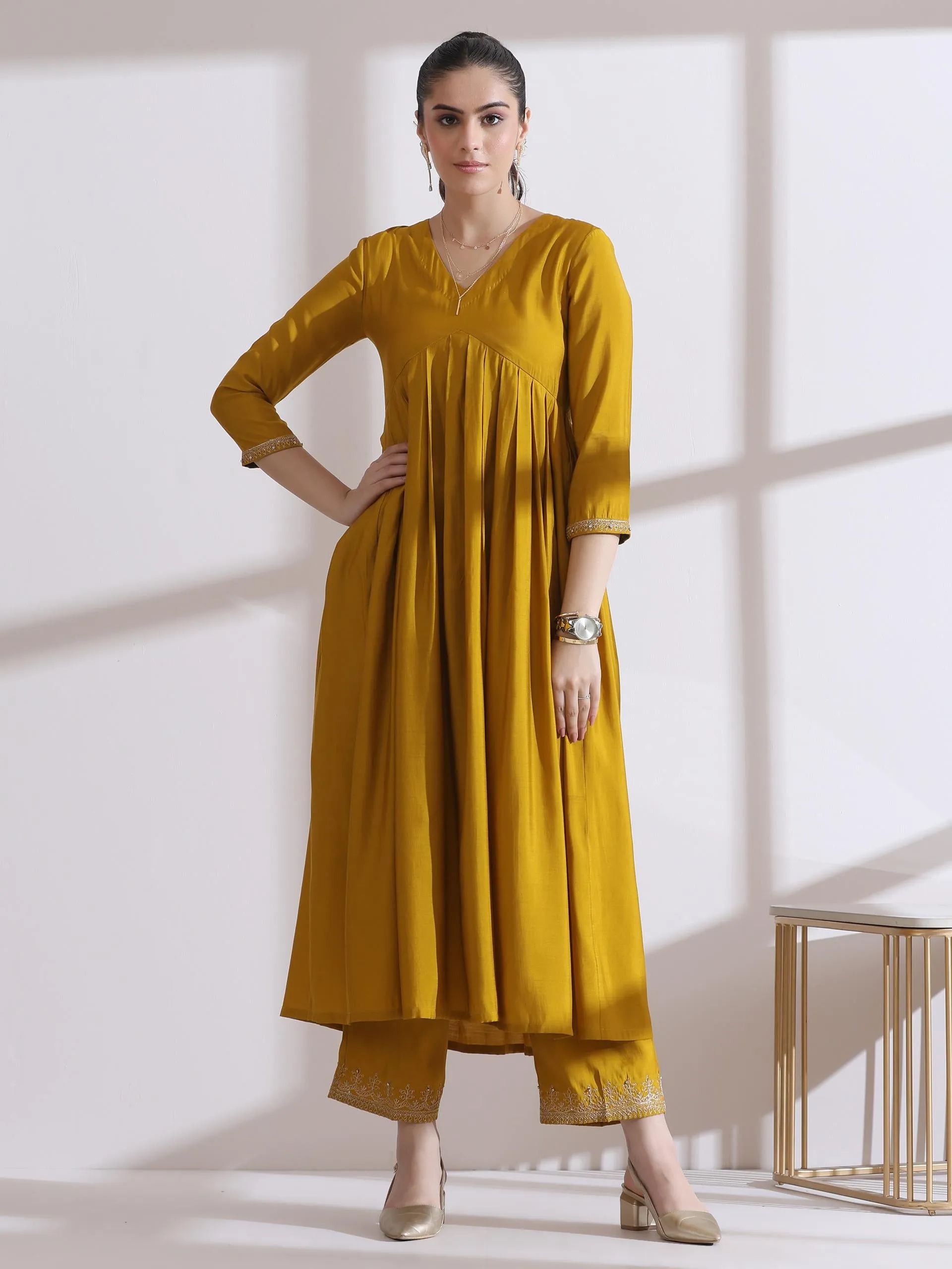 2 Pc Set - Airskin Mustard Kurta With Embroidery On Sleeve And Pants