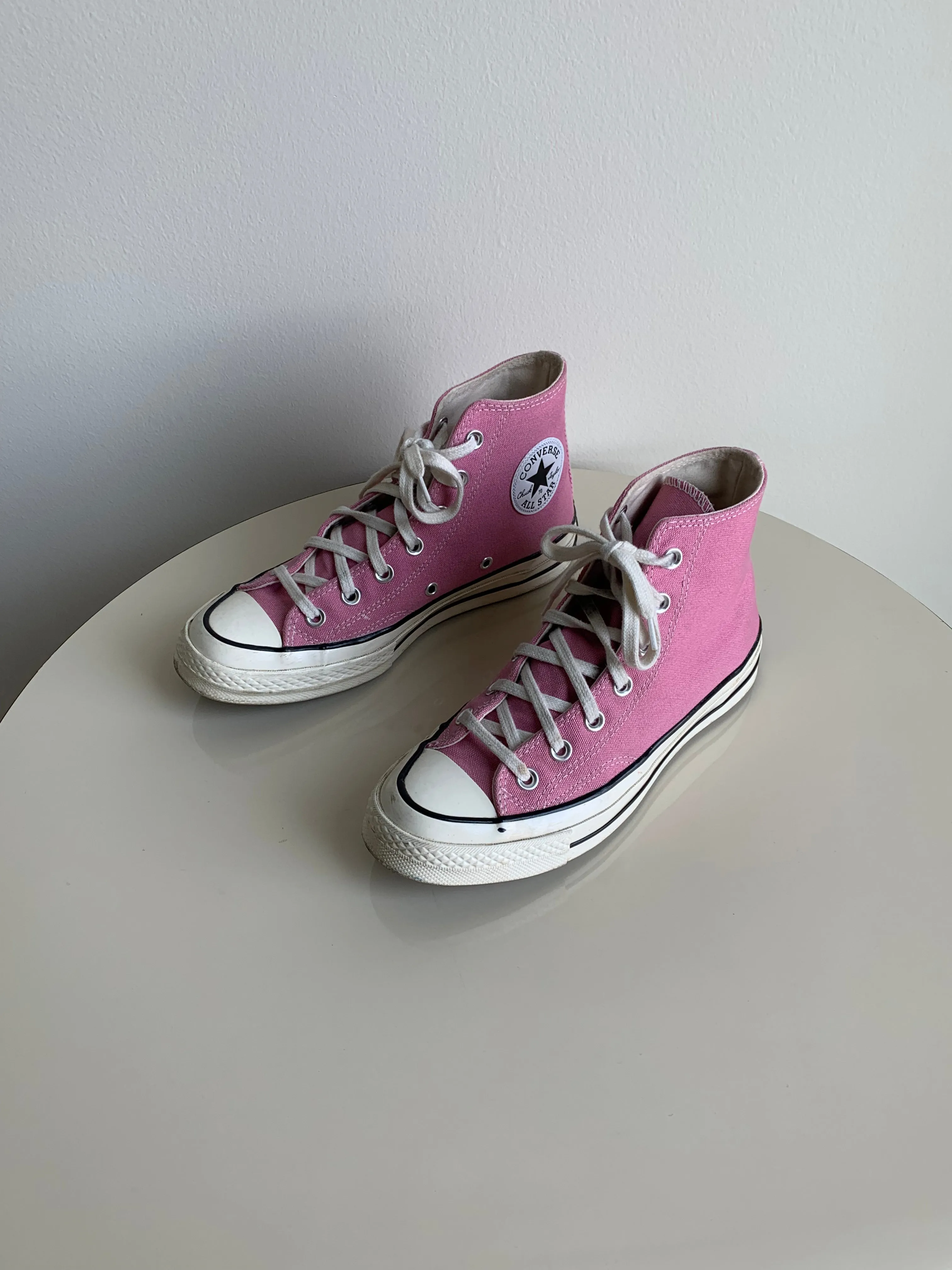 pink Converse high tops