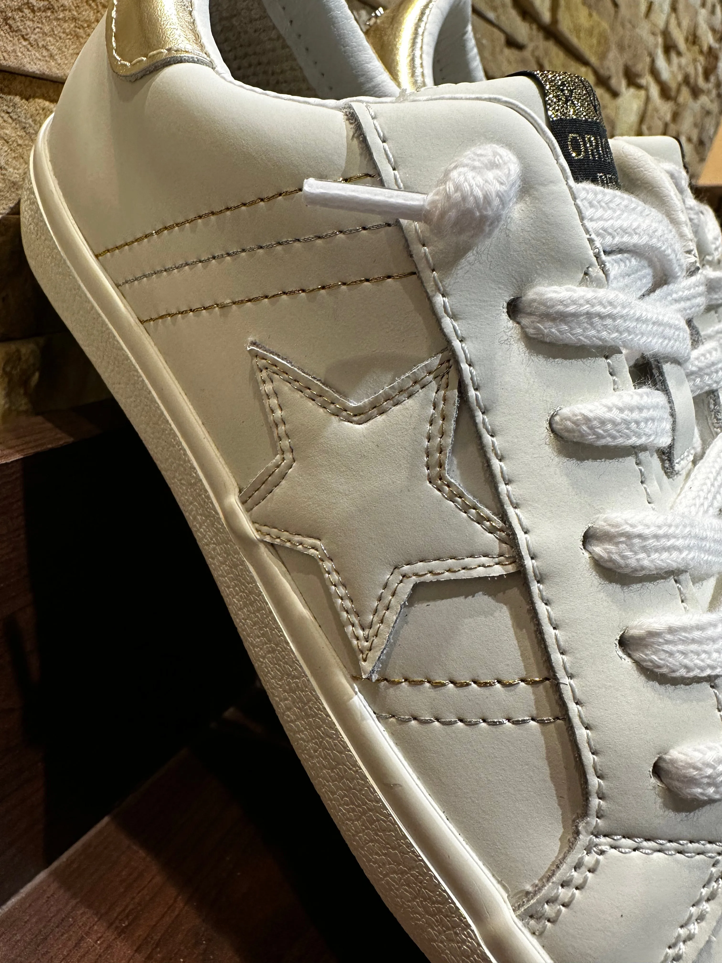 White Gold Striped Low Top Sneaker
